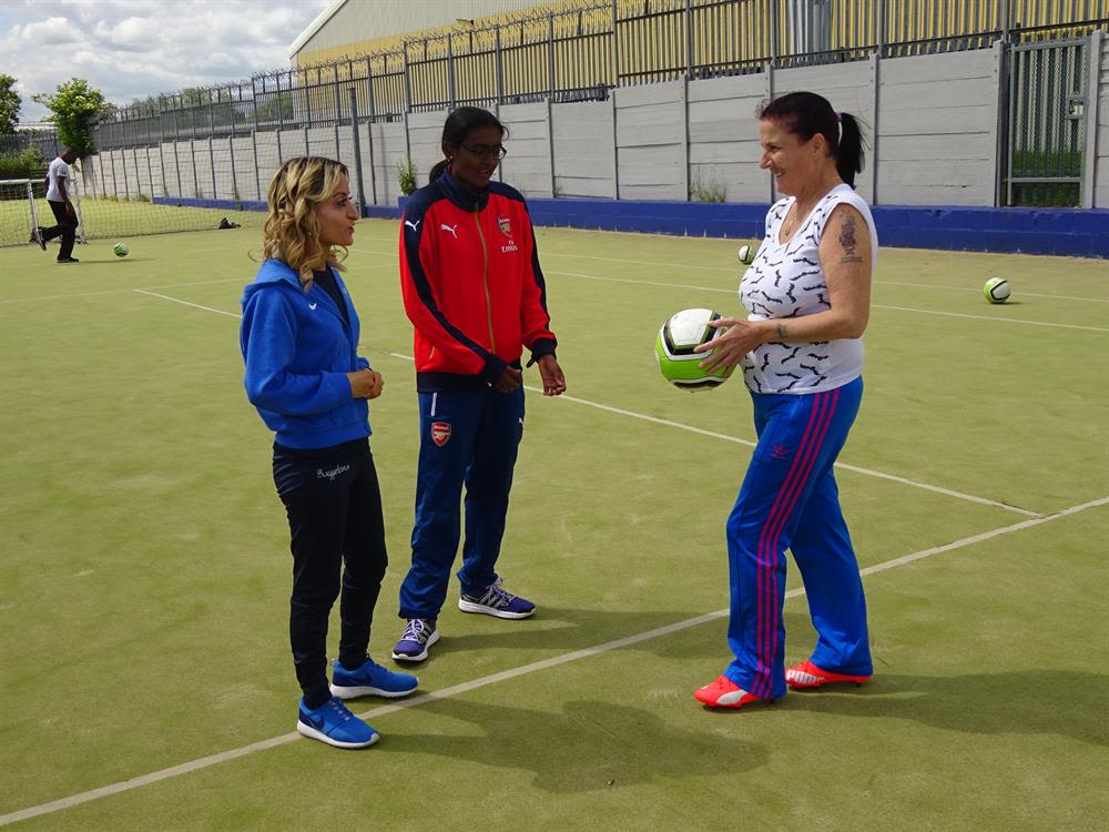 Founder of Swaggarlicious Manisha Tailor MBE mentoring a female participant at the Wingate & Finchley Disabled Fans Forum