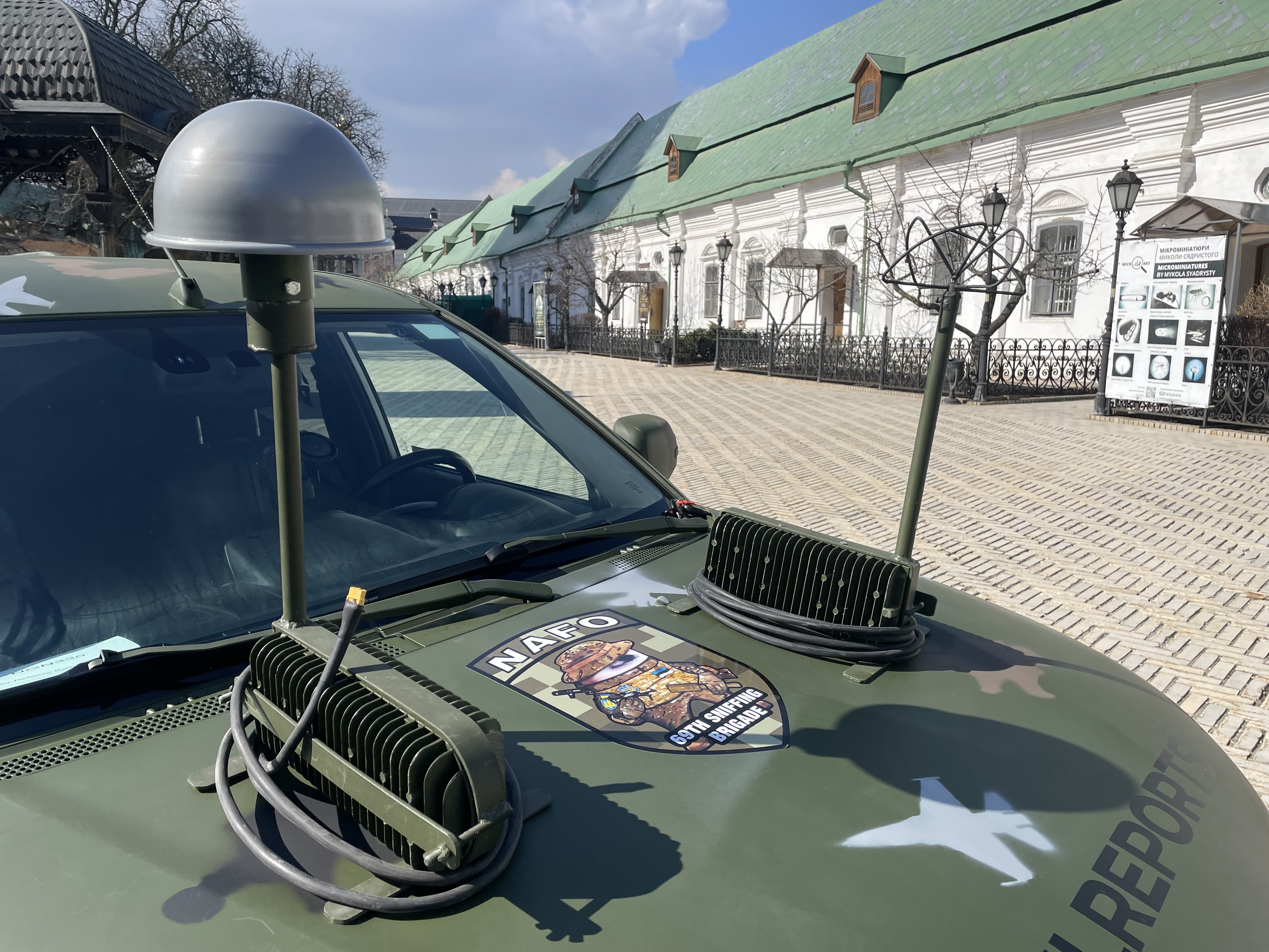 Anti drone jammers on top of the bonnet of a vehicle.